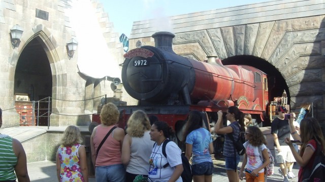 The Hogwarts Express greets visitors as they enter the area.